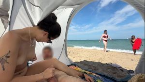 Making him cum in a public beach, with people passing by!
