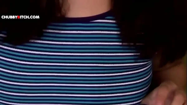 Pretty girl with sexy natural curves playing with her toy