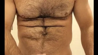 HAIRY MUSCLE BEAR FLEXING, STROKING COCK AND PLAYING WITH NIPPLES