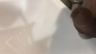 Professional handsome office guy strokes his cock after pissing to relief himself from stress