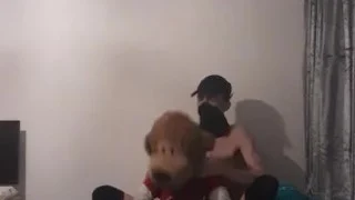 Very skinny teen with a mask and long socks fucks his beloved teddy bear on his bed